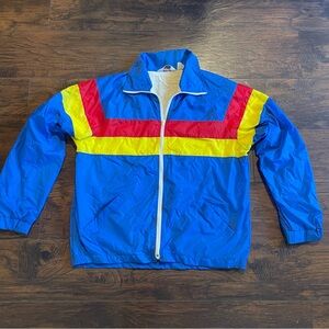 Blue Windbreaker with Red and Yellow Stripes